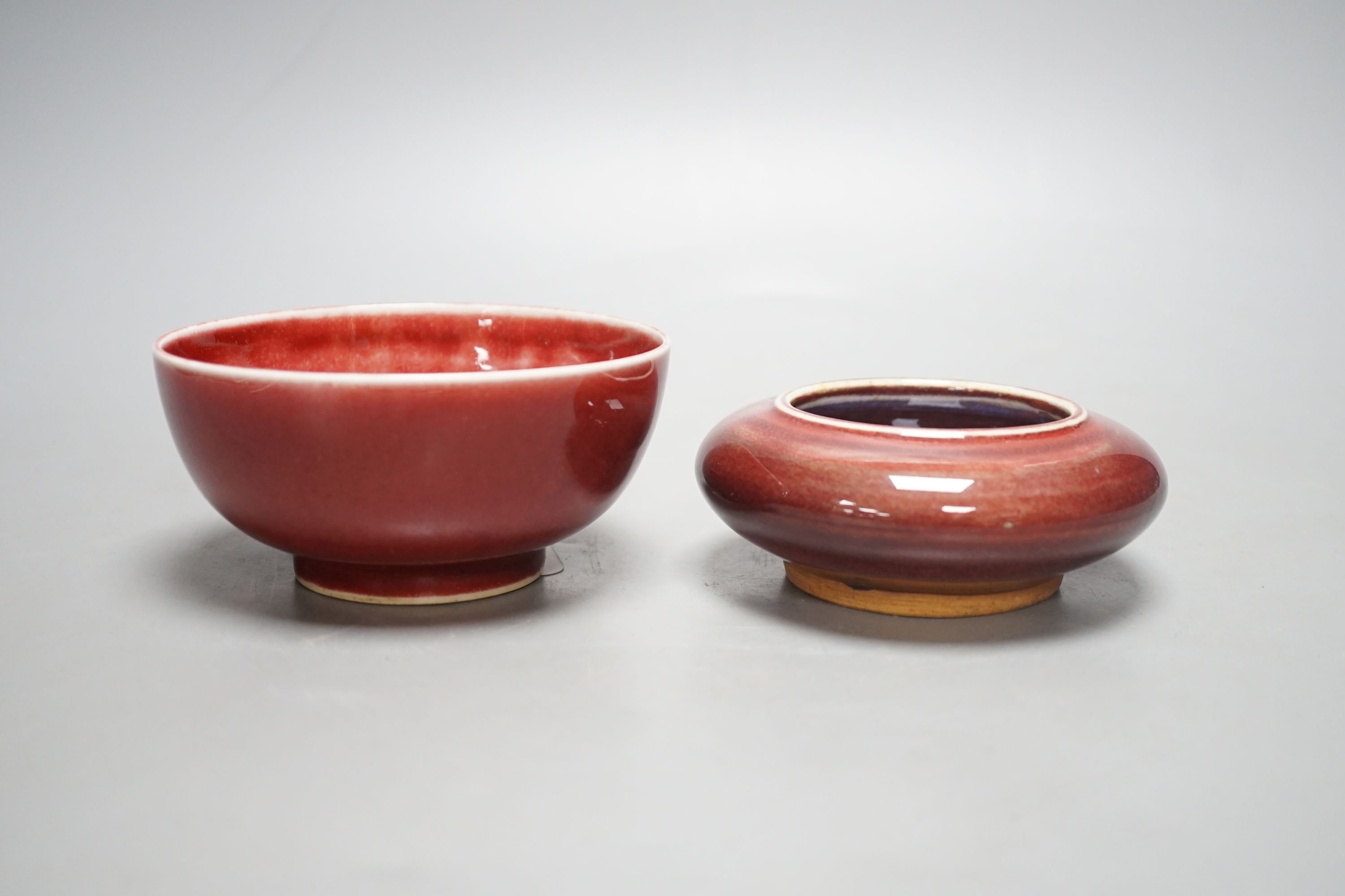A Chinese sang de boeuf bowl and brushwasher, 11.5cm
